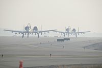  - A-10s on Foxtrot headed for the west arm/de arm pad. Smoke filled day. - by Gerald Howard