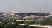  - Shenzhen Airport view from hotel over the 'old' terminal. - by FerryPNL
