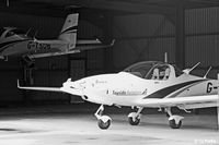  - Tayside Aviation hangar at Dundee EGPN. Note elevated storage system to maximise area. - by Clive Pattle
