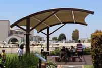 - CMA AirPark Comfort Shade amenity recently added. This novel airpark ideal for aircraft photography. Location: outside Waypoint Cafe with bypass entrance on your left. You need not walk through the cafe, either direction, if only going to/from the AirPark - by Doug Robertson
