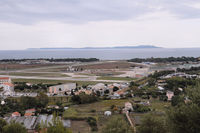  - french navy base in the foreground, civil airport in the background - by olivier Cortot