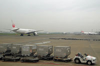  - A grey morning, but Haneda is busy as ever... - by Micha Lueck