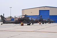  - AH-64Ds of the 120th Squadron, Royal Singapore Air Force parked on the Idaho ANG ramp. Currently undergoing training with the 285th Aviation Regiment, AZ Army National Guard. - by Gerald Howard