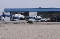  - Helicopters awaiting maintenance at Aviation Air. - by Gerald Howard