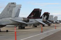  - F/A-18s from VMFAT-101 Sharpshooters and VX-9 Vampires parked on the south GA ramp. - by Gerald Howard