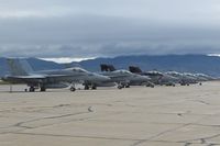  - F/A-18s from VMFAT-101 Sharpshooters and VX-9 Vampires parked on the south GA ramp. - by Gerald Howard