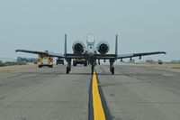  - Following A-10 & emergency equipment on Bravo to ANG ramp. - by Gerald Howard