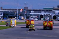  - fire trucks following G-JECY bee  - by andysantini