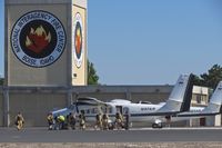  - Smoke jumpers loading up for a mission. - by Gerald Howard