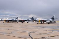  - Three Hawker Hunters from ATAC parked on the south GA ramp. Used for training with active military jets. - by Gerald Howard