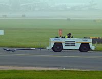  - FBO tug going to get [D-BUZZ CE750] and tow it over to the [FBO exc ramp] at egcc uk. - by andysantini