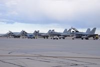  - Four F/A-18Ds and one F/A-18C from VMFAT-101 Sharpshooters, NAS Miramar, CA parked on the south GA ramp. - by Gerald Howard