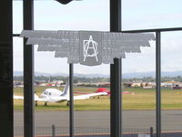  - DCA (Department of Civil Aviation) etched on the window of the waiting lounge - Archerfield Qld - by Arthur Scarf