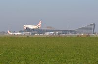  - Overlooking the runway towards the terminal of Lille Lesquin Airport in northern France. - by FerryPNL