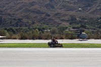  - Pete mowing the grass-will complete mowing length/width of 22L/04R grass runway strip - by Doug Robertson