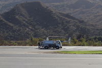  - Refueling Helicopter N454WT at SZP Helipad. Phone number to call is at the helipad. - by Doug Robertson