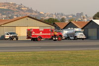  - CAL-FIRE contract support vehicle and fuel tankers in support of fighting the Thomas Fire-note smoky sky - by Doug Robertson