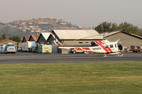  - N496DF 1969 Bell EH-!H IROQUOIS, (CAL FIRE 902) Government USDA Forest Service. Note smoky sky, at SZP FireBase - by Doug Robertson