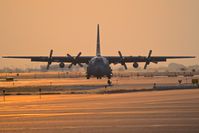  - C-130h from the 153rd AW returning from a fire mission at dusk. - by Gerald Howard