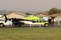  - N922FS 2004 Bell  407, Rolls Royce 250-C47B Turboshaft 813 SHp, 4-blade rotor, at SZP Thomas Fire FireBase. Note smoky skies. - by Doug Robertson