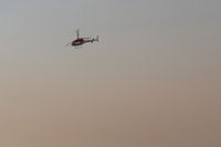  - Unknown fire bomber support overhead SZP Thomas Fire firebase in smoky skies - by Doug Robertson