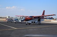  - Back country aircraft on the Gate 58 ramp awaiting passengers. - by Gerald Howard