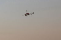  - UNKNOWN-N number does not reveal/compute, Thomas Fire firefighting Helicopter, departing SZP fire base. Note smoky sky - by Doug Robertson