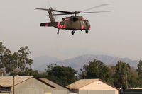  - Unknown Firebomber approach to land-SZP FireBase. No visible correct registration marks. - by Doug Robertson