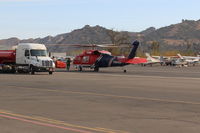  - N135BH 1987 Sikorsky FIREHAWK S-70A-27 GE T700 Series, Restricted class, readying for firebomb action, at SZP  Thomas fire FireBase. - by Doug Robertson