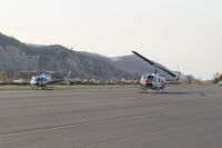  - Thomas Fire FireFighting helicopters at SZP Fire HeliBase. N718GH 2001 Eurocopter and CAL-FIRE 902 FireBombers at the ready- - by Doug Robertson