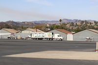  - SZP Thomas FireBase Firefighter's Food Support Truck-last vestige of FireBase Support moving to depart SZP. Note smoky skies from the fire still spreading. - by Doug Robertson