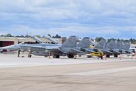  - F/A-18s of VMFAT-101 Sharpshooters, NAS Miramar, CA parked on the south GA ramp. - by Gerald Howard