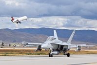  - BOI sometimes has a nice mix of military and commercial aircraft. F/A-18D on Taxiway Bravo is from VMFAT-101, NAS Miramar, CA. - by Gerald Howard