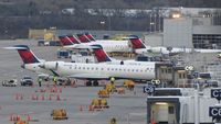  - Delta aircraft parked at the C concourse. - by Gerald Howard