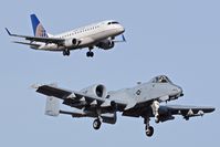  - The A-10C for RWY 10R. The United Express for 10L. - by Gerald Howard