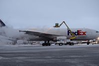  - Fed Ex A-300 under going de icing. - by Gerald Howard