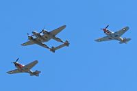  - Flyby of a P-38J and two P-40s during the airshow. - by Gerald Howard