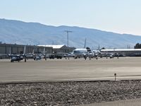  - Numerous aircraft parked on the NIFC ramp during fire season. - by Gerald Howard