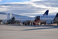  - Sometimes aircraft break. Passengers had to ground load from the terminal to another aircraft. - by Gerald Howard