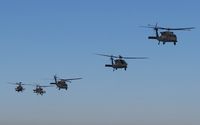  - UH-60s & AH-64s from the 1-183rd AVN BN, Idaho Army National Guard flying out for training. - by Gerald Howard