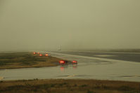  - The sun doesn't always shine....

Hawaiian B717 N485HA disappears down 8R into the murk, seen from N194DN, DL1284 waiting our turn - by Pete Hughes