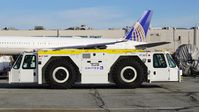  - United Airlines tug. 2018. - by Clayton Eddy