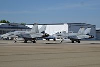  - Two F/A-18s from VMFA-314 “Black Knights”, NAS Miramar, CA parked on the sough GA ramp.
 - by Gerald Howard