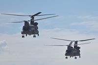  - Two CH-47Fs from the Washington Army National Guard departing Taxiway Bravo. - by Gerald Howard
