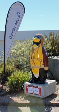  - A penguin statue dressed in WWII flying gear has appeared at the Airport Terminal at Dundee, EGPN. It is one of 80 that have been hatched around Dundee City as a charity fundraiser and placed at key locations. This one is called 'I believe I can fly' - by Clive Pattle