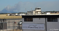  - Airfield view at Blackpool. In the background a wild moorland fire at Stalybridge dominates the skyline. - by Clive Pattle