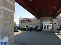 - MAIN BUILDING AT Fond Du Lac - very busy during EAA - by magnaman