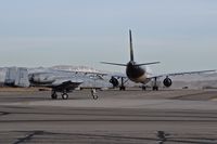  - Idaho ANG A-10C turning behind a UPS 767 waiting for runway clearance. - by Gerald Howard