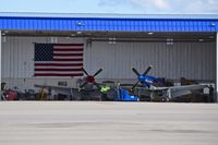  - Two Mustangs owned by Mustang High Flight LLC, Boise, Idaho seeing daylight after a long winter in the hangar. - by Gerald Howard