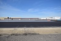  - Cement and asphalt are ready for the two hangars to be moved. - by Gerald Howard